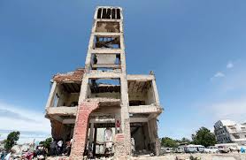 People stand on the ruins of the former Somali parliament building in the  capital Mogadishu – ACCORD