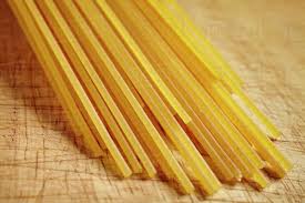 Uncooked spaghetti - Stock Photo - Dissolve