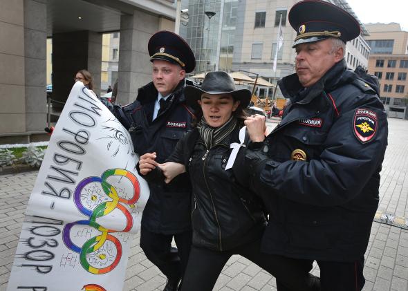 181776818-police-officers-detain-a-gay-rights-activist-during-an.jpg.CROP.promo-mediumlarge.jpg