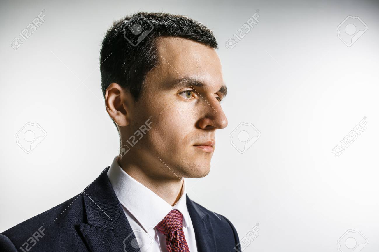 99779526-three-quarter-portrait-of-a-businessman-with-very-serious-face-confident-professional...jpg