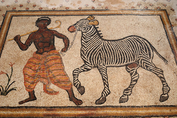 Black-man-leading-zebra-mosaic.jpg