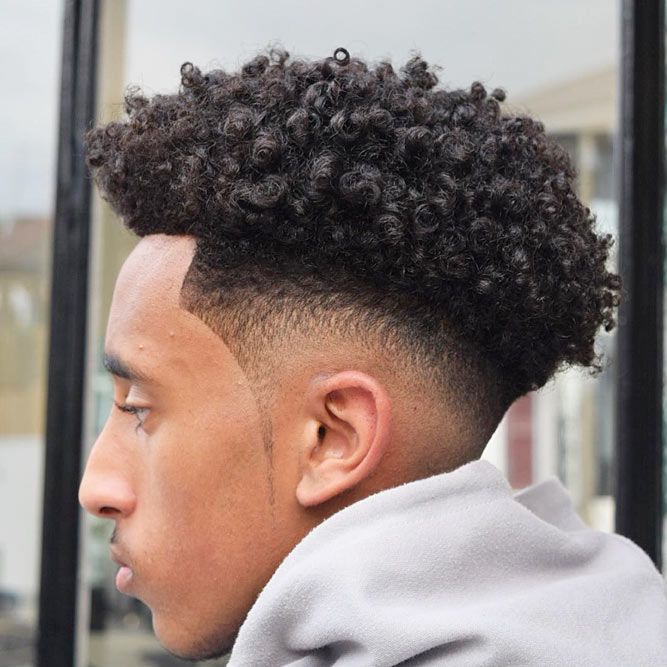black-men-hairstyles-guide-medium-curls-low-fade.jpg