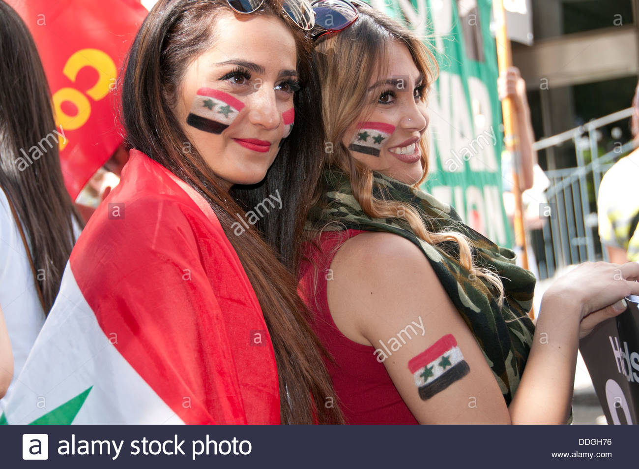 demo-against-intervention-in-syria-young-syrian-women-with-flags-painted-DDGH76.jpg