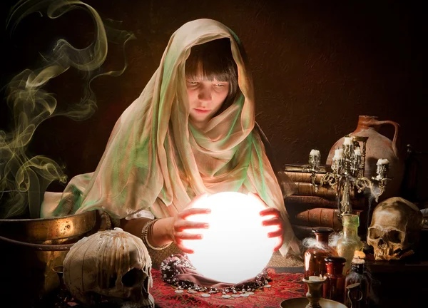 depositphotos_13046622-Scrying-with-a-crystal-ball_edit_126105236302631.jpg