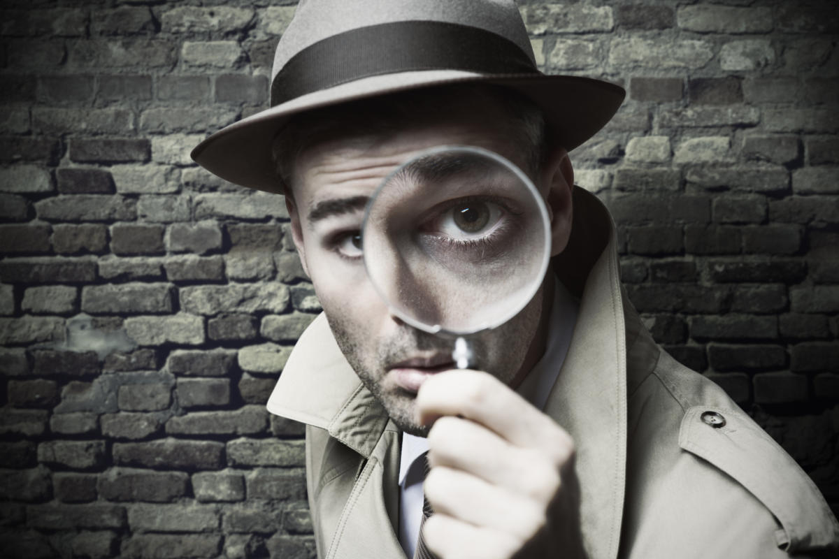 detective-with-magnifying-glass-100735058-large.jpg