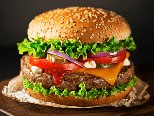 Hamburger-with-Sesame-Seeds-Cheese-and-Veggies-500x375.png