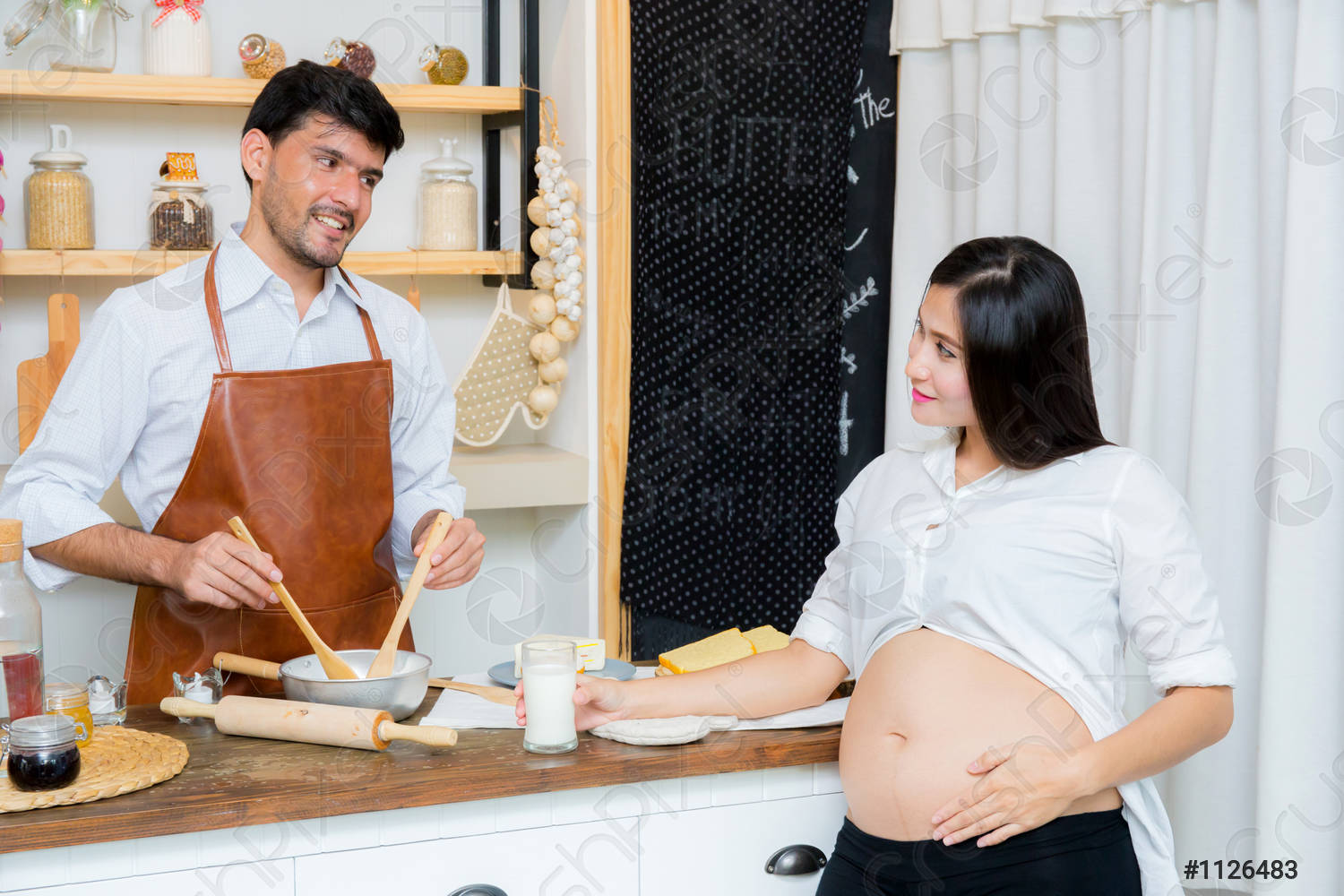happy-husband-pregnant-wife-kitchenasian-1126483.jpg
