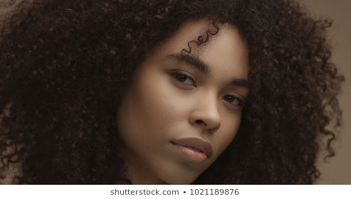mixed-race-black-woman-portrait-260nw-1021189876.jpg