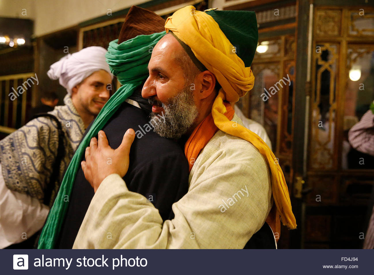 naqshbandi-sufi-muslims-hugging-FD4J94.jpg