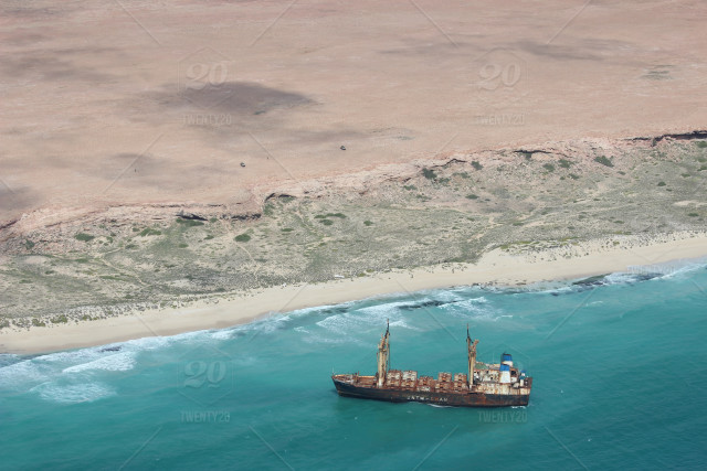 stock-photo-boat-beach-landscape-ship-africa-ocean-shore-pirates-hostages-da778a63-8d6c-4ded-9...jpg