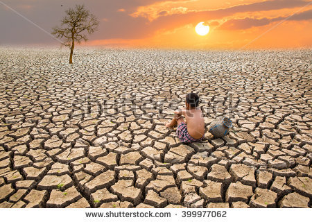 stock-photo-child-sit-on-cracked-earth-in-the-arid-area-399977062.jpg