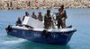 marine-forces-in-puntland-receive-two-coffins-containing-the-remains-of-slain-somali-pirates.jpg