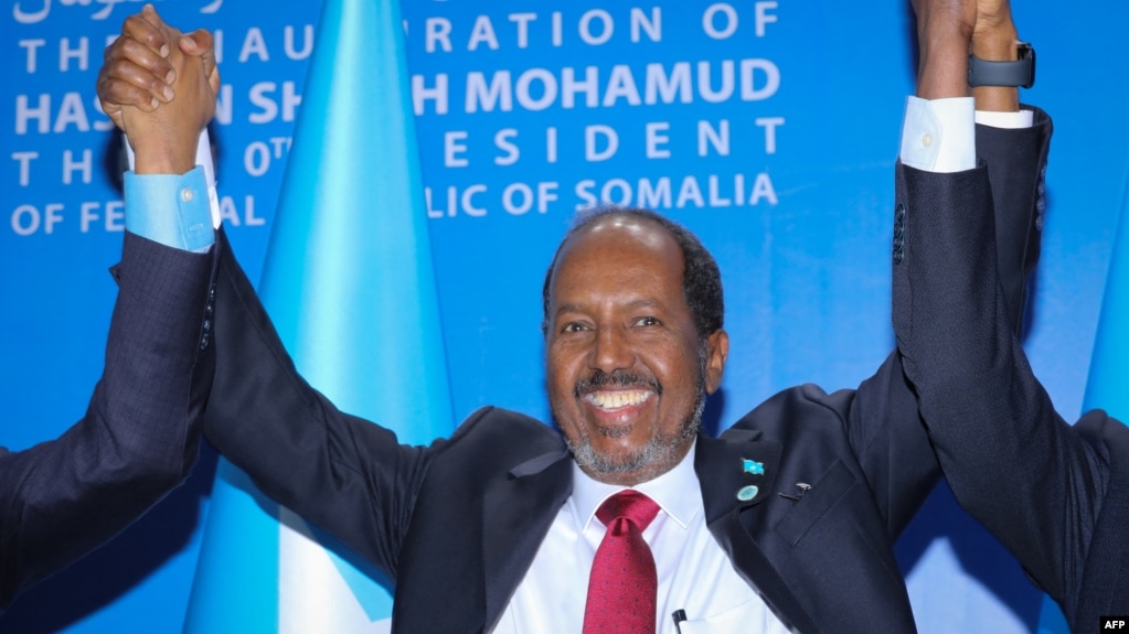 Somalia's new president Hassan Sheikh Mohamud celebrates during his inauguration as his country's 10th president in Mogadishu, Somalia, on June 9, 2022. 