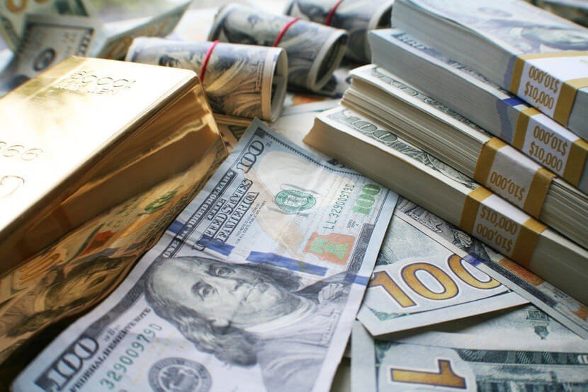 gold-bars-stacks-of-cash.jpg