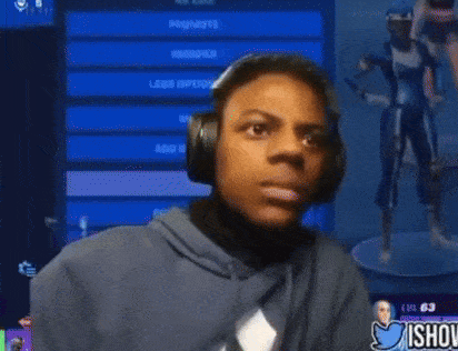 a young man wearing headphones is smiling in front of a screen that says  promote 