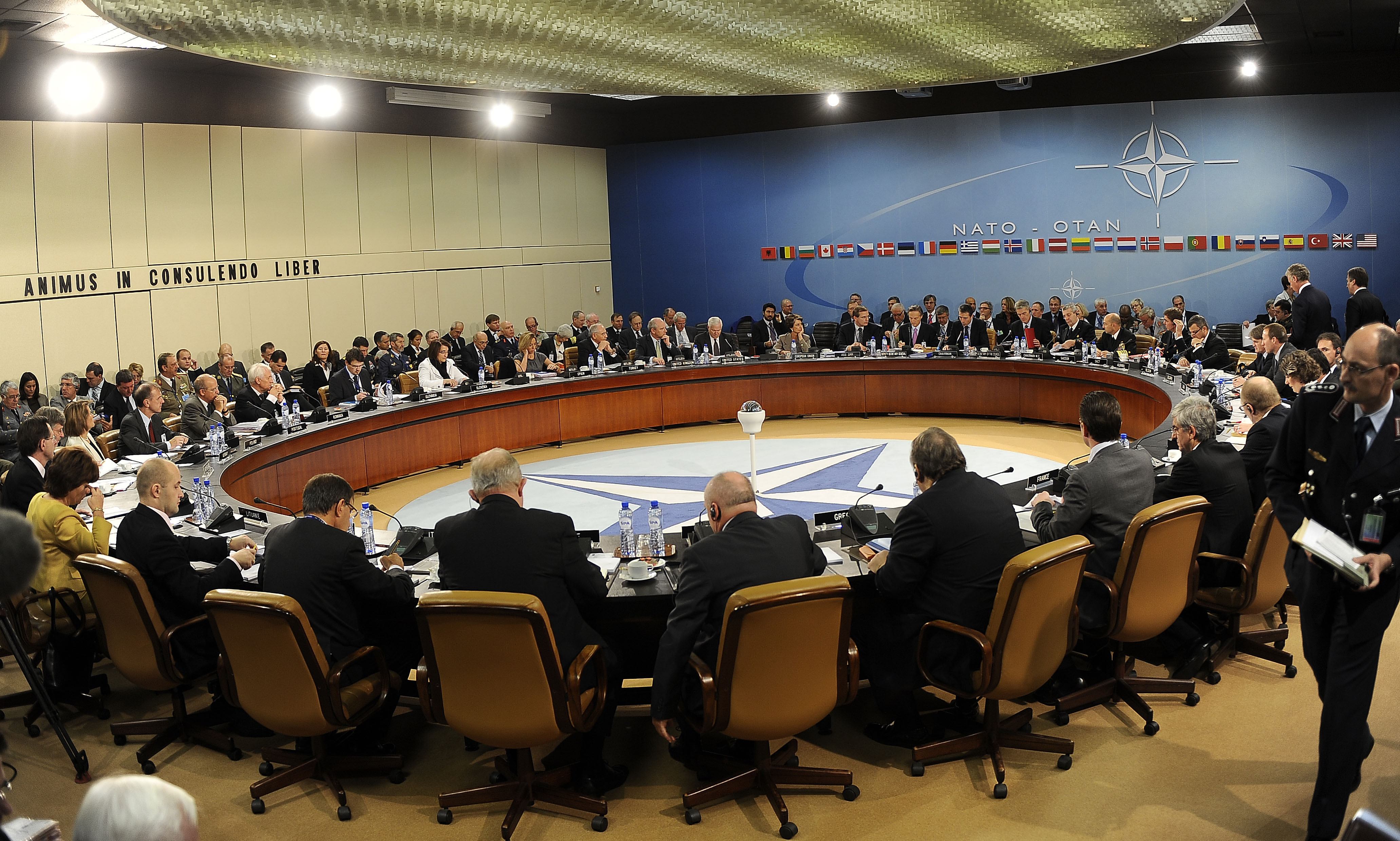 Defense.gov_News_Photo_101014-F-6655M-004_-_Secretary_of_Defense_Robert_M._Gates_and_other_NATO_Ministers_of_Defense_and_of_Foreign_Affairs_meet_together_at_NATO_headquarters_to_give_final.jpg
