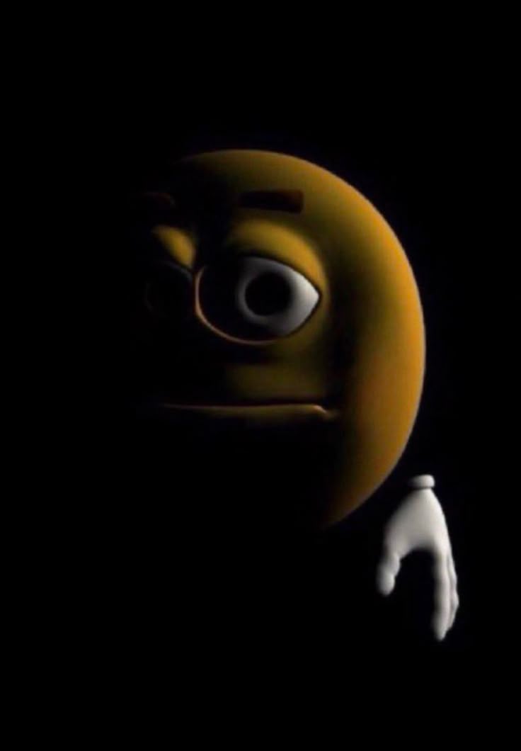 yellow emoji in darkness