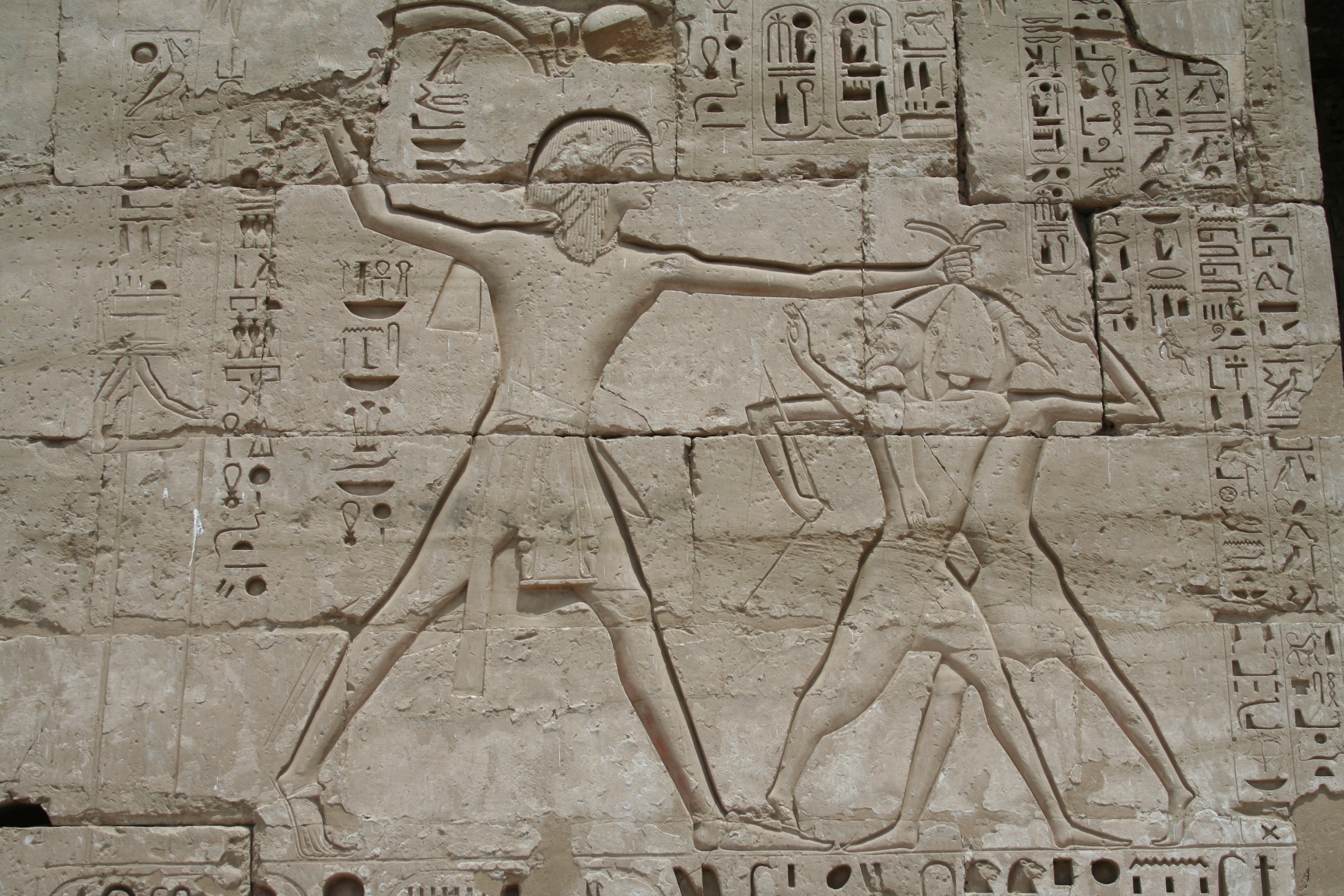 Medinet-Habu-sandals-smiting-Egypt.jpg