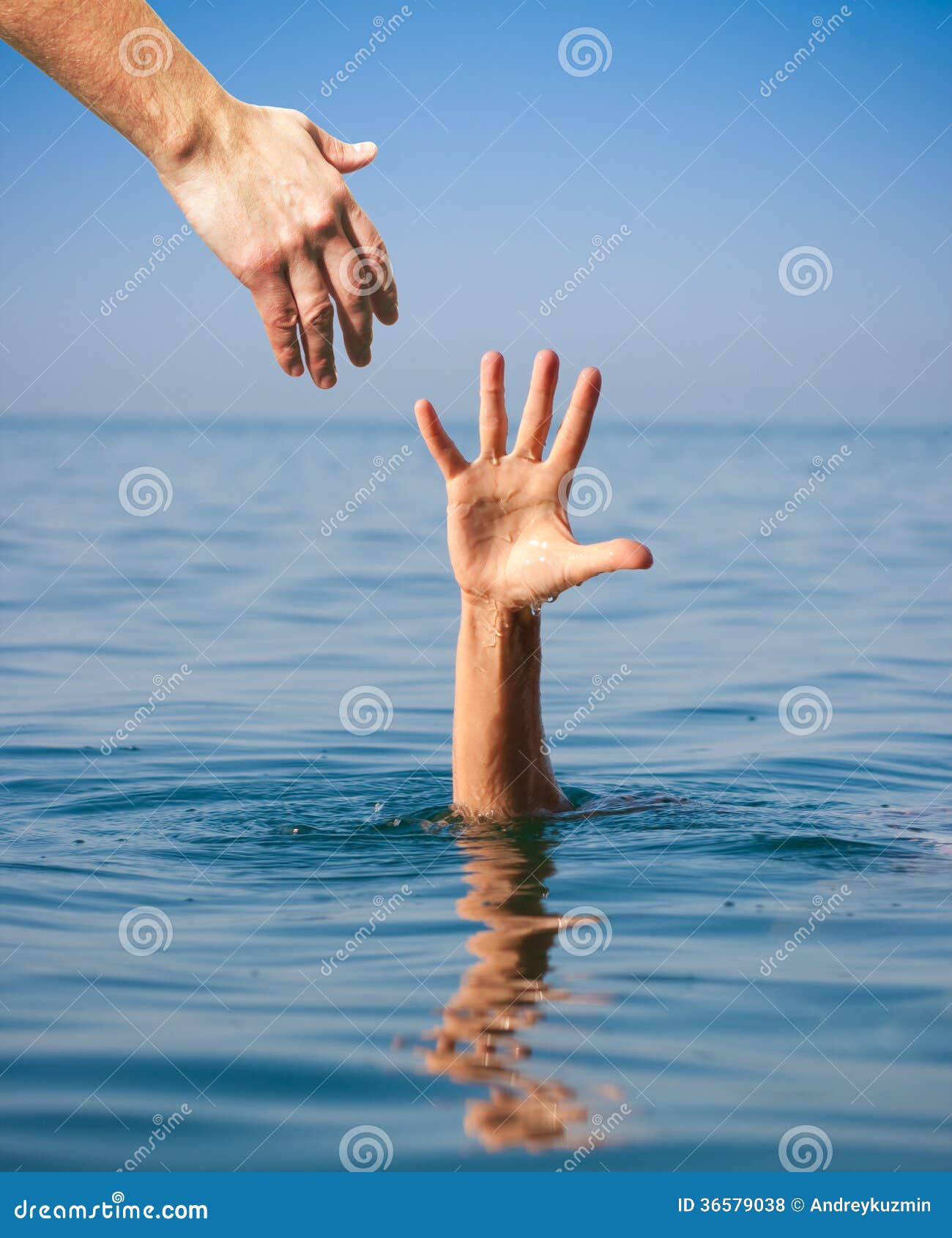 helping-hand-giving-to-drowning-man-sea-36579038.jpg