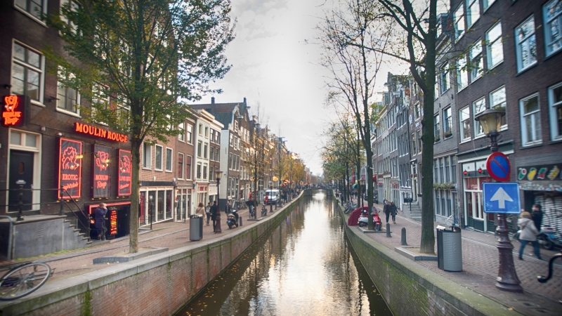 Amsterdam red light district during day canal view