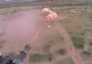 1250675630_helicopter_machine_gun.gif