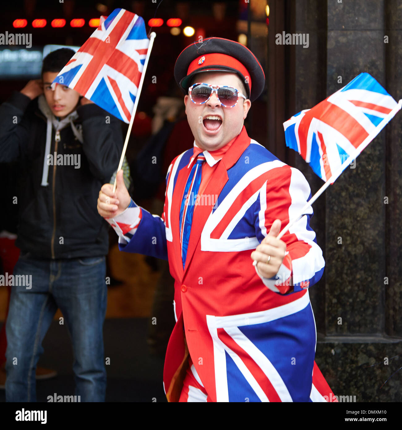 man-wearing-an-union-jack-suit-outside-a-tourist-shop-in-london-DMXM10.jpg