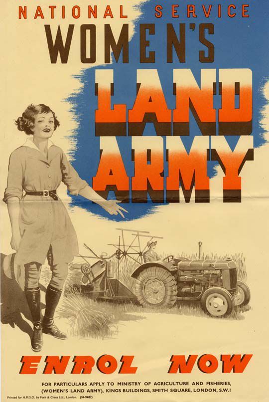 Poster shows a woman standing in uniform with a tractor in the background and has the words 'Women's Land Army Enrol Now' in capital letters.