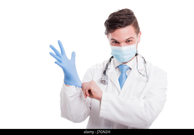 young-medic-pulling-on-medical-gloves-getting-ready-for-operation-j7gn2h.jpg