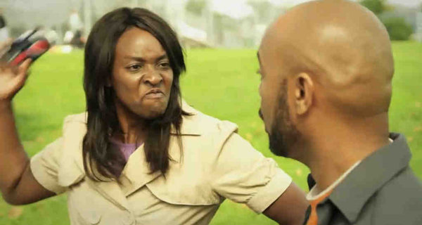 mean-black-woman-beating-her-black-husband-never-hit-a-woman-2015.jpg