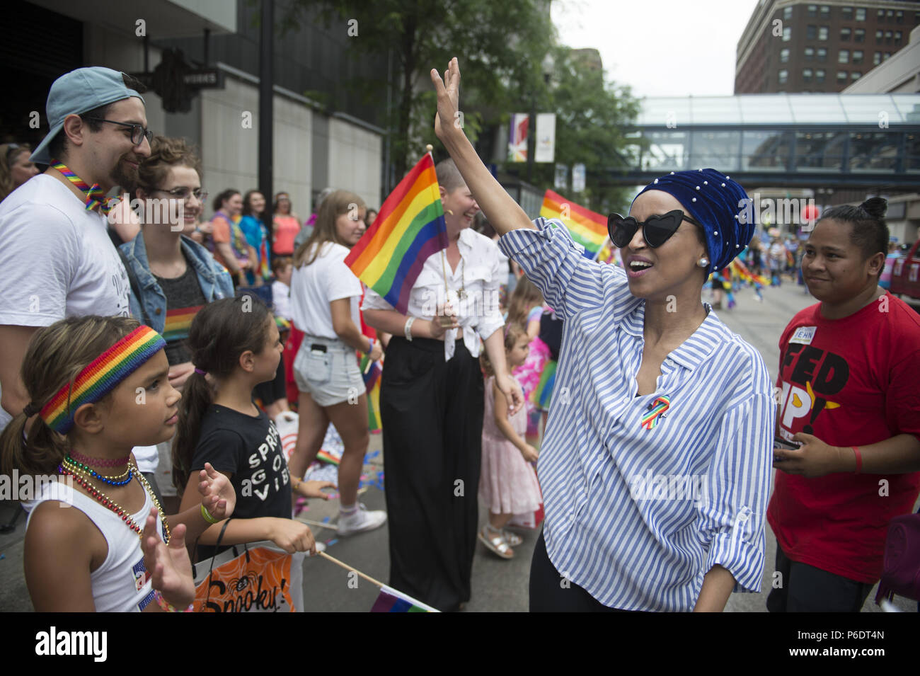 minneapolis-minnesota-usa-24th-june-2018-state-rep-ilhan-omar-the-dfl-endorsed-candidate-for-the-us-5th-congressional-district-campaigns-at-the-pride-parade-in-minneapolis-mn-credit-craig-lassigzuma-wirealamy-live-news-P6DT4N.jpg