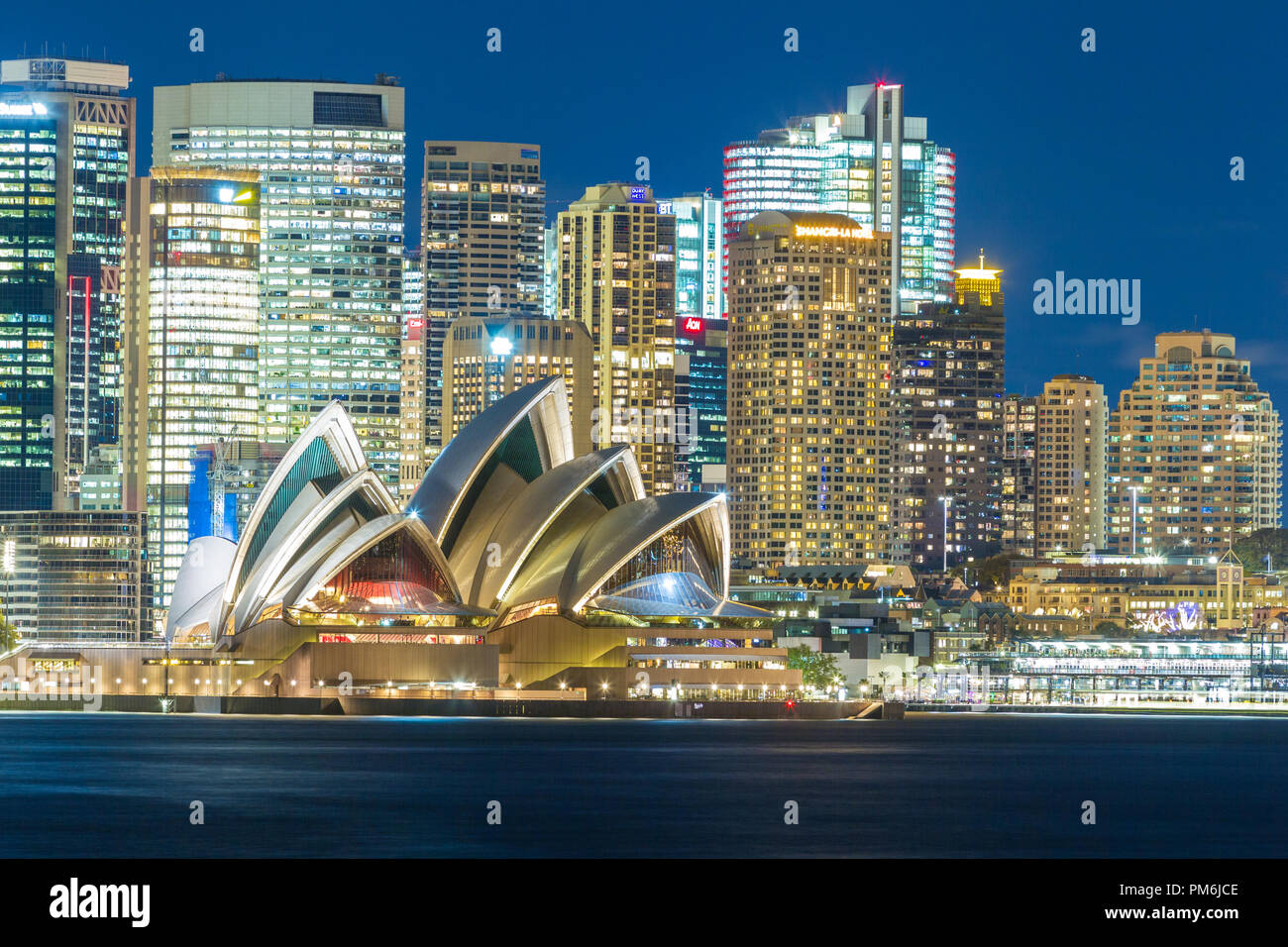 the-city-of-sydney-australia-including-sydney-opera-house-seen-by-night-PM6JCE.jpg
