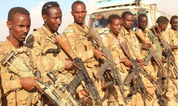 Al-Shabab-militants-At-least-61-killed-in-attack-on-Somali-military-base.jpg