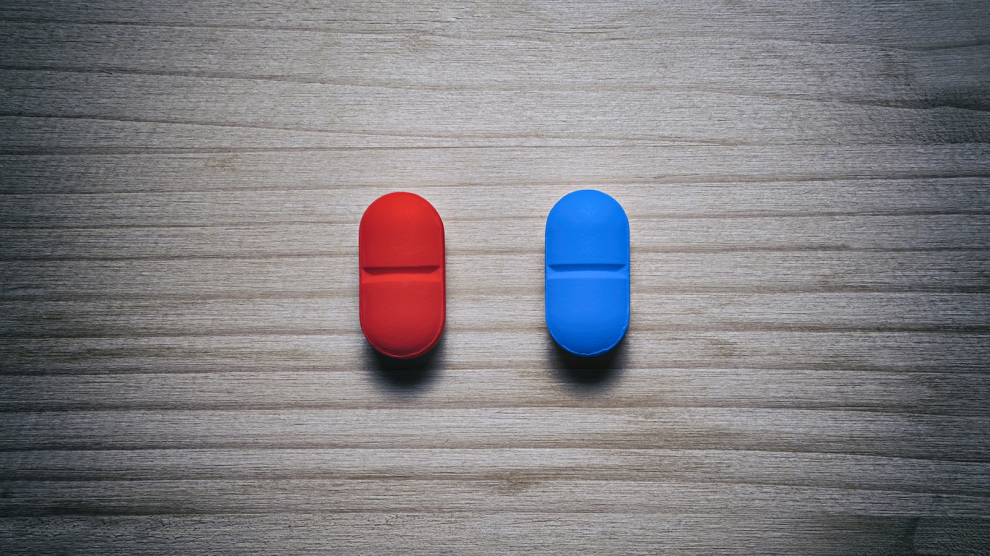 bigstock-red-pill-blue-pill-concept-on-278354245-990x556.jpg