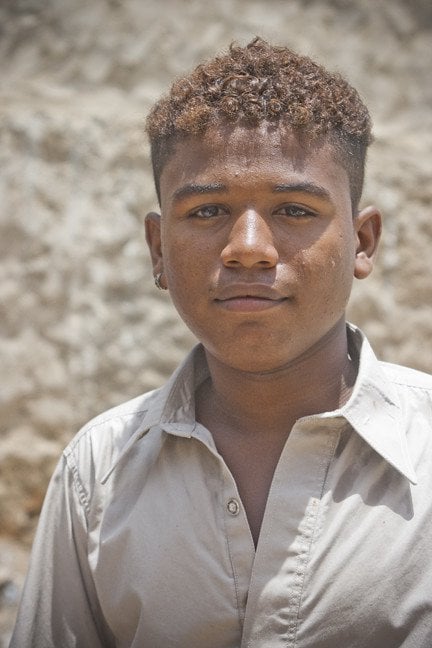 Portrait shot of a Sheedi (Afro Pakistani) boy at Mangopir Festival :  pakistan