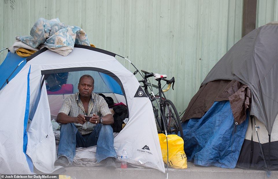 17719198-7396585-Homeless_encampments_have_been_set_up_around_the_city_-a-84_1566918414855.jpg