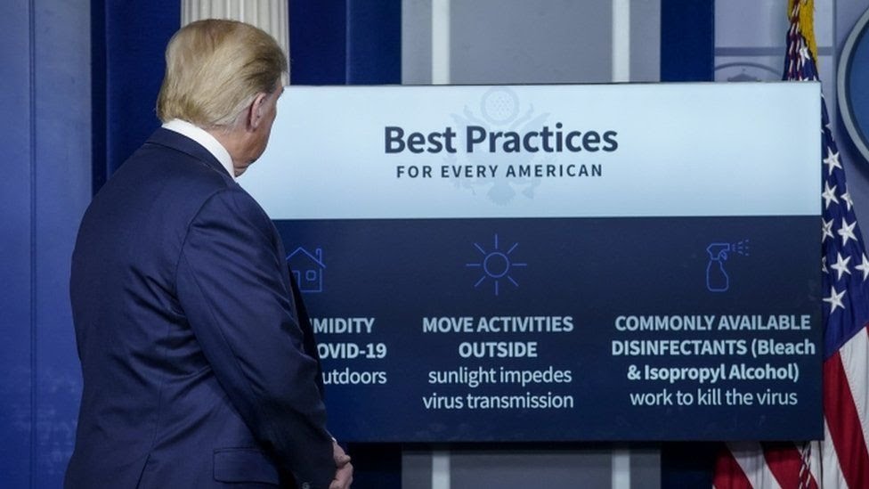 Donald Trump with a list of possible Covid-19 treatments at the White House briefing, 23 April 2020 Donald Trump with a list of possible Covid-19 treatments at the White House briefing, 23 April 2020
