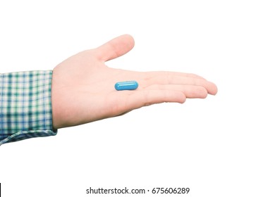 hand-holds-blue-pill-isolated-260nw-675606289.jpg