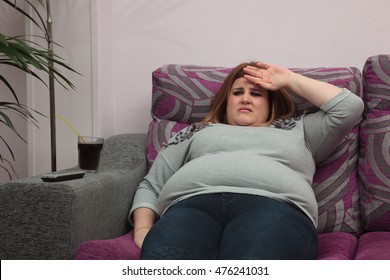 upset-overweight-woman-sitting-couch-260nw-476241031.jpg