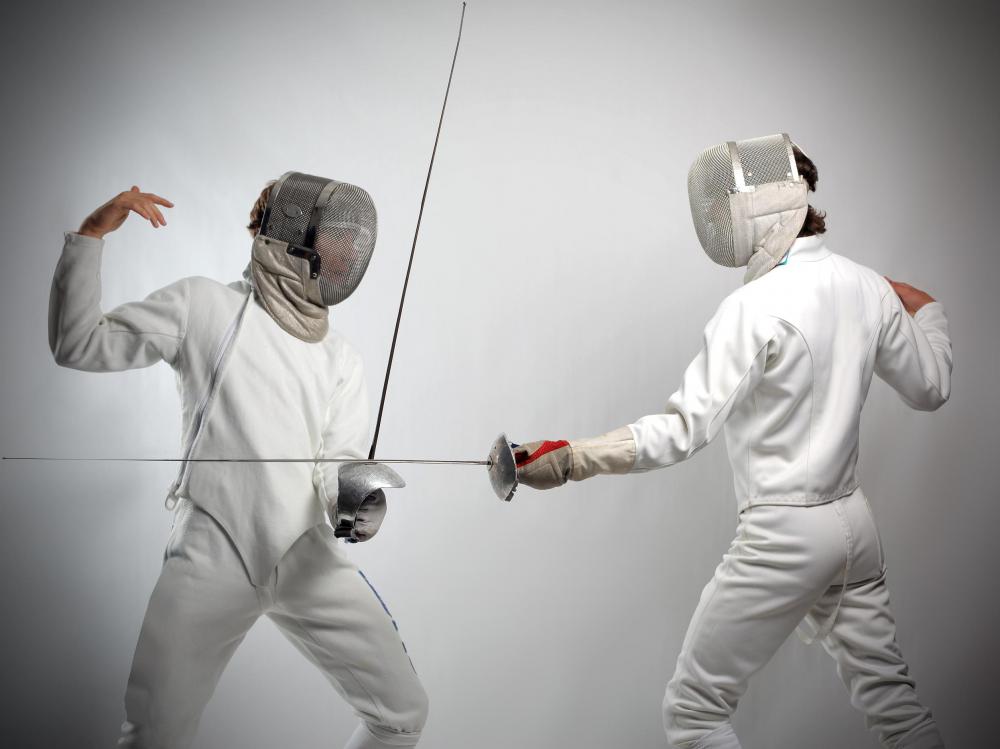 two-people-in-white-doing-fencing.jpg