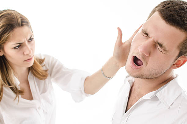 angry-young-woman-slap-boyfriend-with-her-hand-picture-id475987653