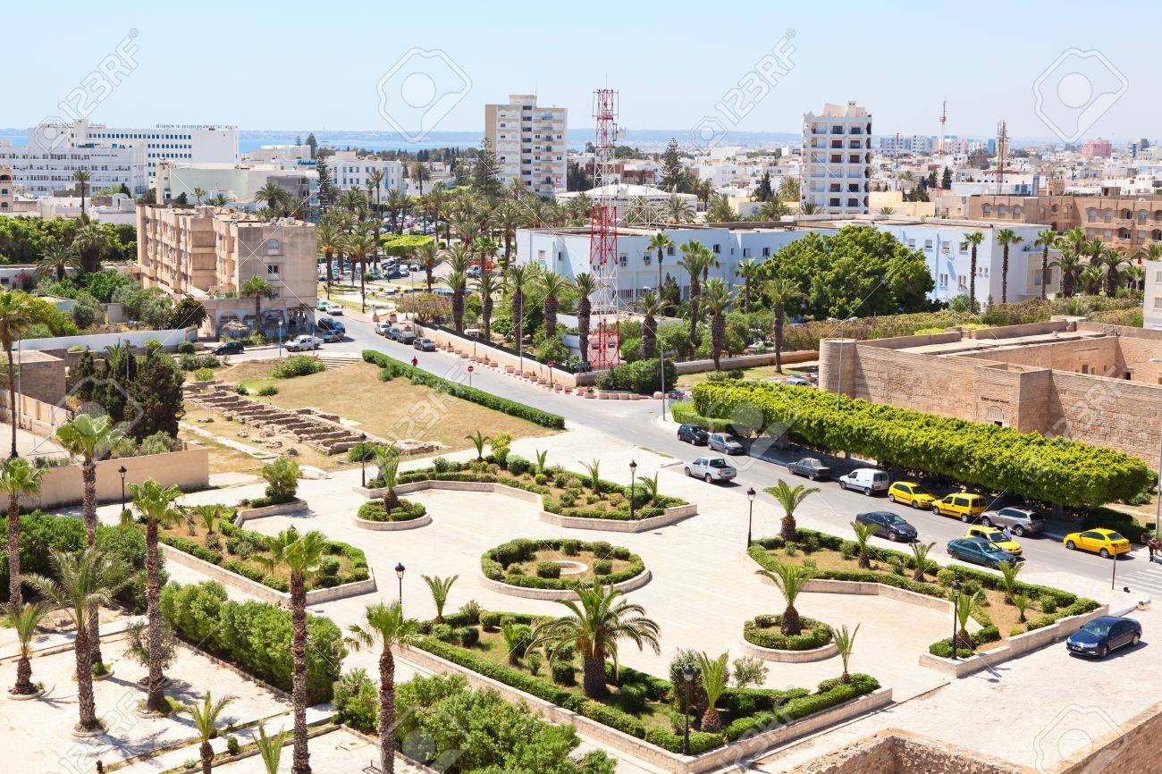 63543303-aerial-view-of-streets-at-monastir-city-tunisia-africa-modern-buildings-and-palm-trees-avenue-.jpg