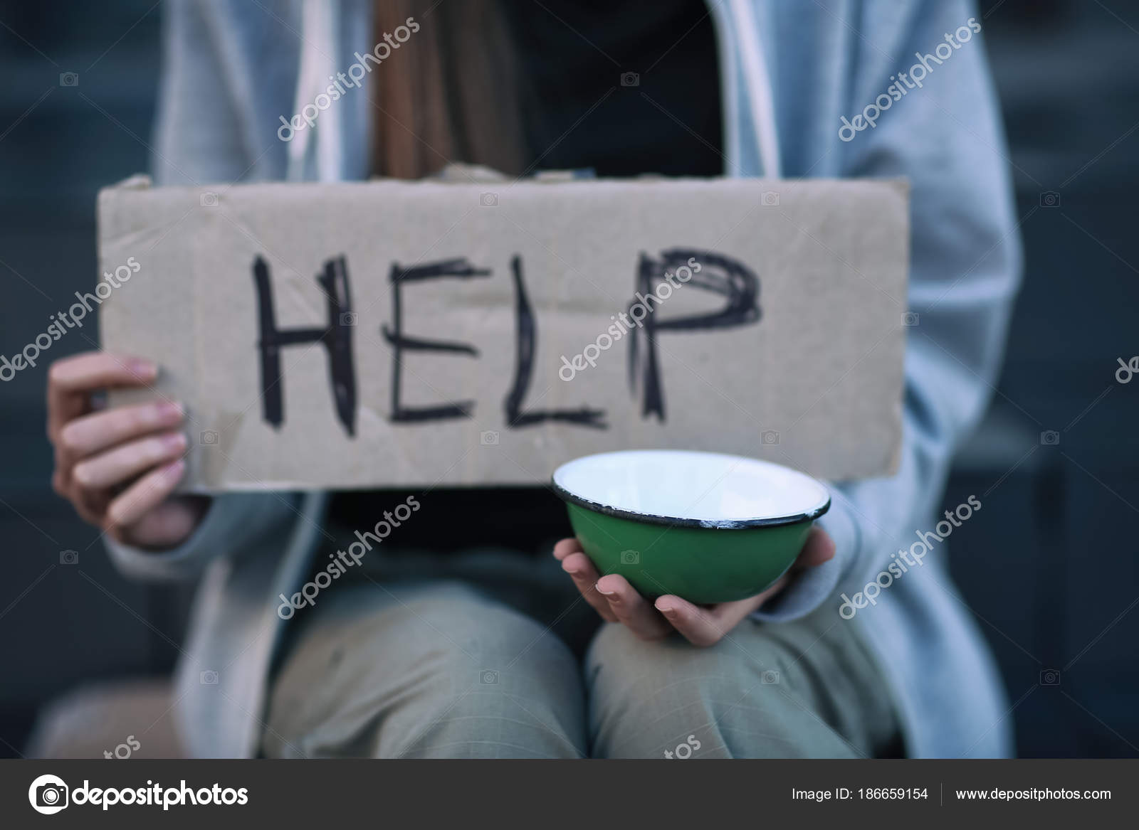 depositphotos_186659154-stock-photo-homeless-poor-woman-holding-empty.jpg
