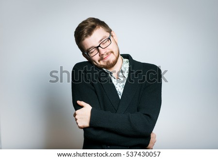 stock-photo-young-businessman-hugging-himself-stylish-wear-glasses-close-up-manager-537430057.jpg
