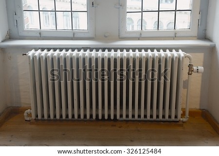 stock-photo-closeup-of-a-heating-radiator-326125484.jpg