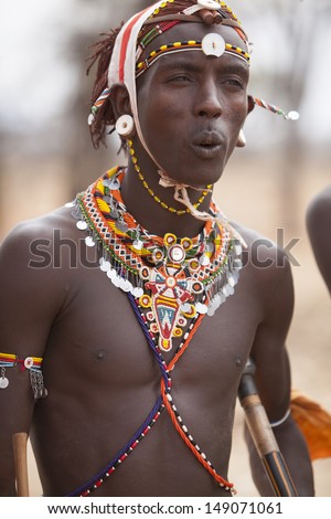 stock-photo-josphet-cultural-boma-samburu-kenya-july-st-unidentified-samburu-warrior-on-july-st-in-149071061.jpg