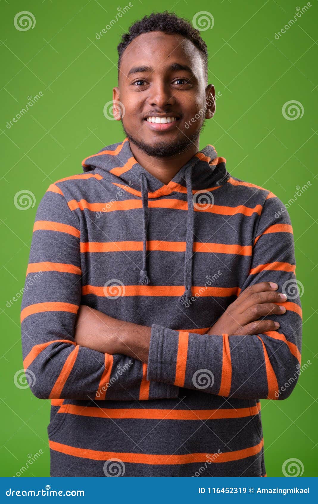studio-shot-young-handsome-african-man-against-green-background-young-handsome-african-man-against-green-background-116452319.jpg