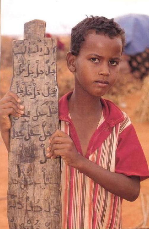 Somali_boy_with_prayer_tablet.jpg